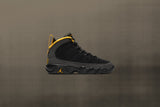 Air Jordan 9 Retro (GS) "University Gold" - Black/Dark Charcoal
