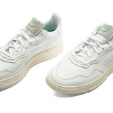 SC Premiere - Footwear White/Power Green/Off White